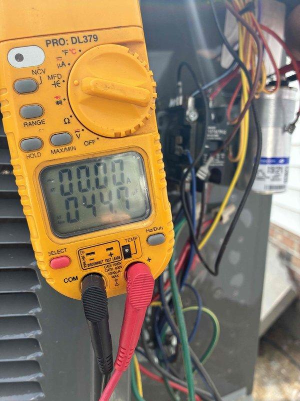 Completed scheduled cooling system preventive maintenance visit on residential air conditioning unit. Performed comprehensive electrical diagnostics using digital multimeter to verify proper voltage, amperage, and capacitance readings across system components. All electrical connections inspected and tested, with measurements confirming equipment operating within manufacturer specifications.