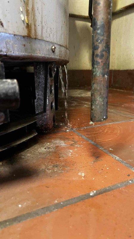 Performed commercial boiler inspection and assessment. Unit exhibited extensive corrosion on tank, piping, and components, with significant oxidation on copper lines and mounting hardware. Based on advanced age, deterioration of critical components, and overall system condition, recommended replacement of unit to prevent imminent failure and ensure continued reliable operation.