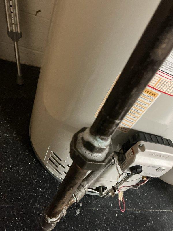 Responded to gas leak call at 57-year-old residential property. Located and inspected natural gas piping system in basement utility area. Identified leak at corroded pipe joint connection near water heater. Performed pressure test on gas line to confirm leak location and assess system integrity. Shut off gas supply and repaired compromised fitting, replacing corroded connection with new approved gas-rated components. Conducted post-repair pressure test to verify leak elimination and ensure all connections met code requirements. Restored gas service and documented conditions with photographs for record.