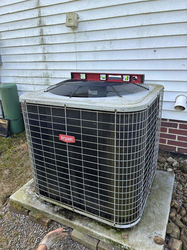 Returned to service location to address outdoor condensing unit that was not level. Used precision leveling tools to assess and correct unit positioning on concrete pad, ensuring proper drainage and optimal compressor operation. Replaced failed dual-run capacitor to restore system functionality and prevent compressor damage.