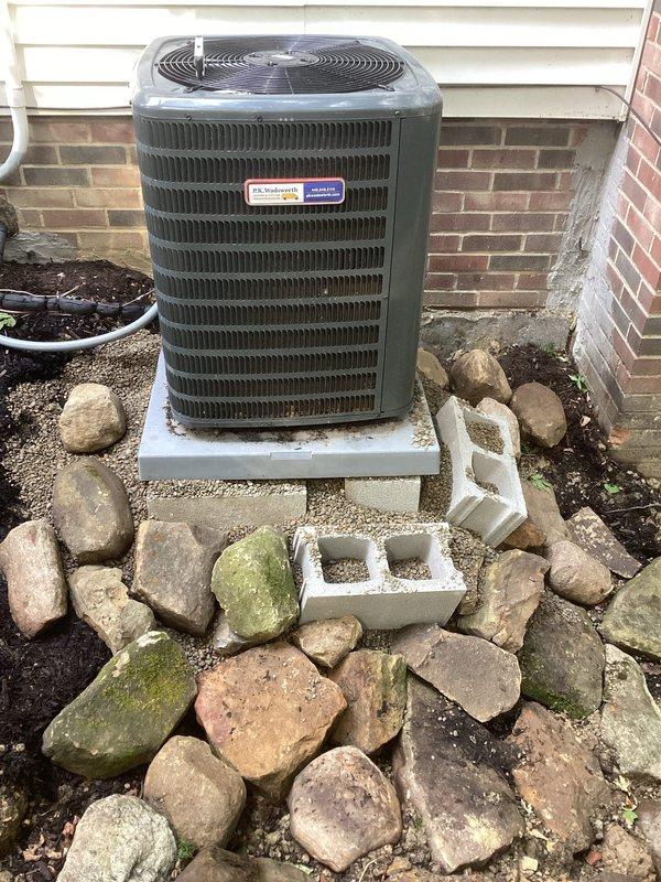 Returned to property to level outdoor condensing unit on concrete pad after previous repair work. Adjusted unit positioning and verified stable installation on elevated pad with proper drainage. Performed complete preventative maintenance service including system inspection and operational verification to ensure optimal performance following leveling adjustment.
