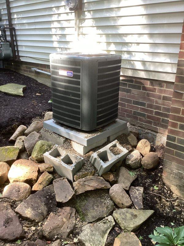 Returned to property to level outdoor condensing unit on concrete pad after previous repair work. Adjusted unit positioning and verified stable installation on elevated pad with proper drainage. Performed complete preventative maintenance service including system inspection and operational verification to ensure optimal performance following leveling adjustment.