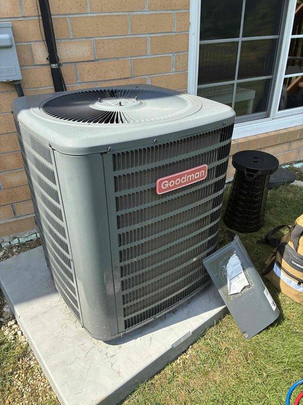 Completed scheduled preventive maintenance on residential Goodman split-system air conditioning unit. Performed comprehensive inspection of outdoor condensing unit including visual examination of cabinet, coil condition, and fan operation. Inspected indoor air handler components and verified proper airflow through existing mesh filter assembly. All system components found operating within normal parameters with no deficiencies noted at time of service.