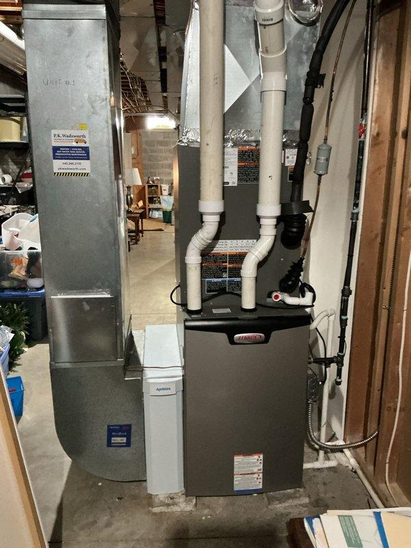 Completed comprehensive cooling maintenance on three HVAC systems as part of recurring preventive maintenance program. Serviced indoor furnace/air handler unit located in basement mechanical room, including inspection of ductwork, venting system, and electrical connections. Performed maintenance on two outdoor condenser units positioned on gravel pad beneath covered porch area, verifying proper operation of compressors, fan motors, and refrigerant levels. All three systems inspected, cleaned, and confirmed operational with no issues identified requiring repair.