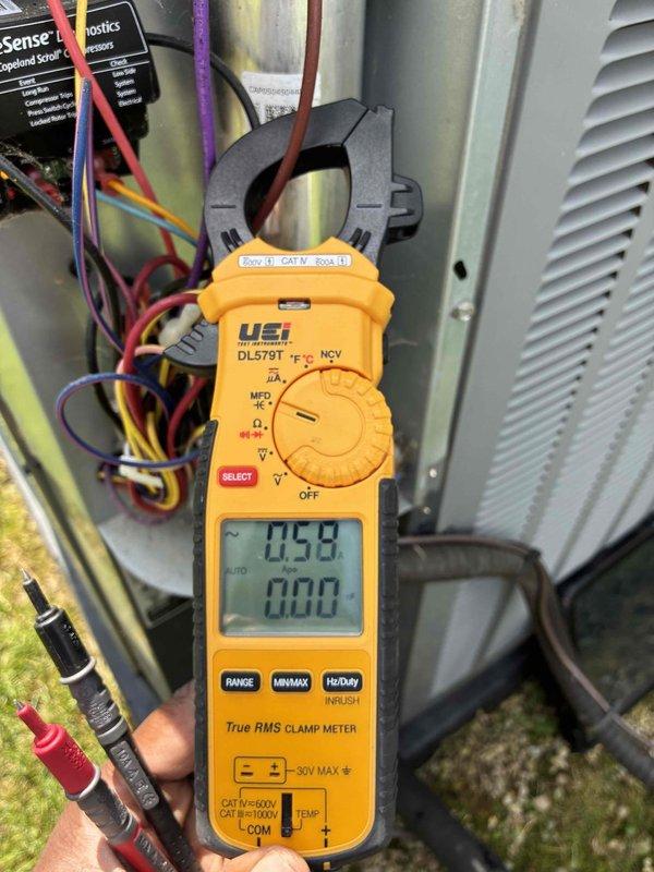 Completed routine cooling system maintenance as part of scheduled preventive service plan. Performed electrical current measurements using clamp meter to verify proper compressor and fan motor amperage draw, inspected evaporator coil assembly and heat exchanger fins for cleanliness and airflow efficiency, and documented system conditions with photos. All components operating within normal parameters.