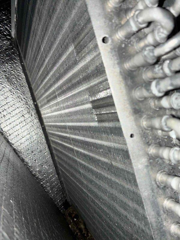 Completed routine cooling system maintenance as part of scheduled preventive service plan. Performed electrical current measurements using clamp meter to verify proper compressor and fan motor amperage draw, inspected evaporator coil assembly and heat exchanger fins for cleanliness and airflow efficiency, and documented system conditions with photos. All components operating within normal parameters.
