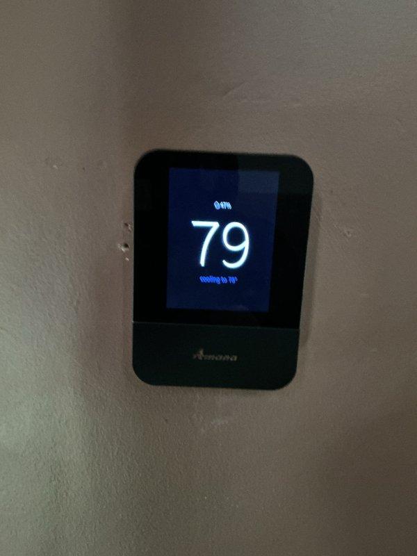 Completed scheduled preventive maintenance on Amana R32 residential cooling system. Performed comprehensive inspection of outdoor condensing unit including condenser coils, electrical connections, and refrigerant lines; verified proper operation of all components and confirmed thermostat functionality with system cooling to setpoint of 79°F.