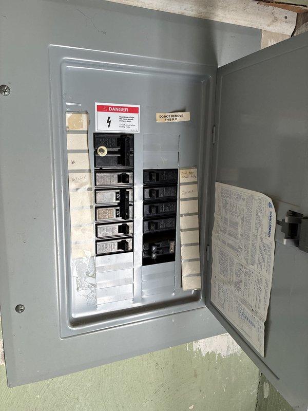 Conducted on-site assessment for furnace replacement options at residential property with easy access to equipment. Documented existing electrical infrastructure including main service panel and exterior meter configuration to ensure compatibility with proposed HVAC system upgrades.