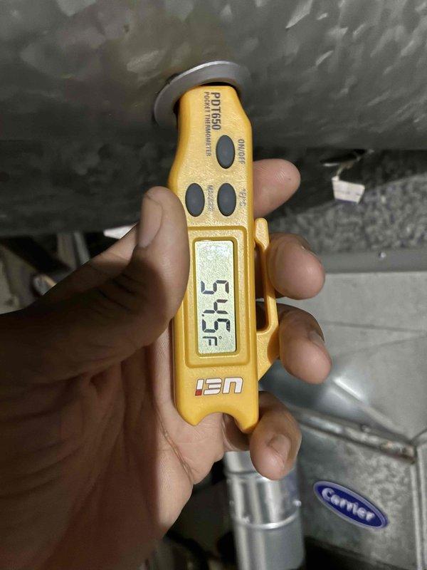 Completed routine MVP cooling maintenance on Carrier HVAC system. Performed comprehensive inspection of air handler and refrigerant lines, recording supply air temperature of 55°F and verifying proper system operation. Measured and documented temperature differential across the evaporator coil to confirm adequate cooling performance and system efficiency within manufacturer specifications.