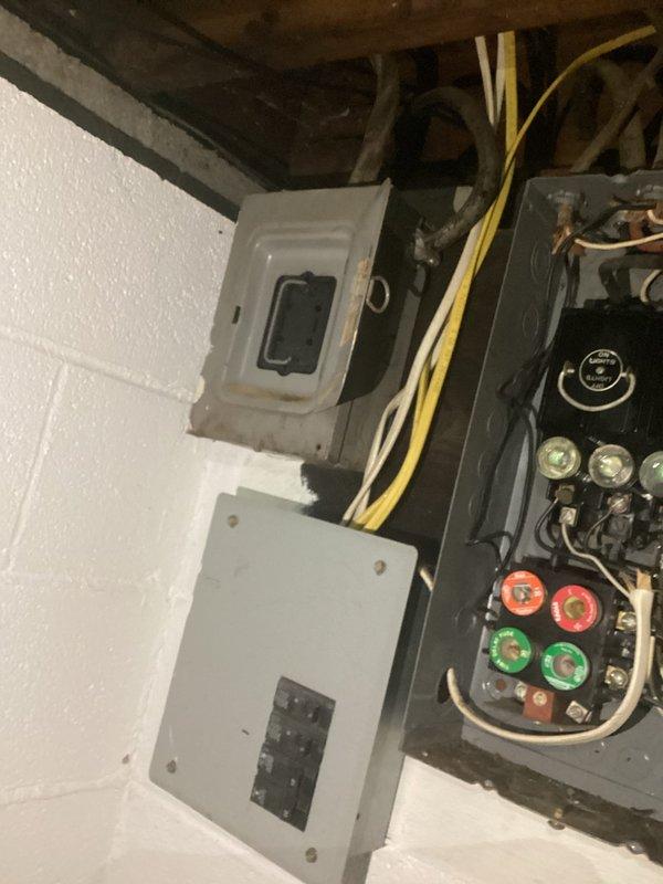Performed comprehensive electrical inspection of church facility focusing on main electrical service equipment. Evaluated existing breaker panel and disconnect switch condition, documented aging electrical infrastructure including outdated fuse-type components and mixed panel configurations requiring modernization to meet current code requirements.