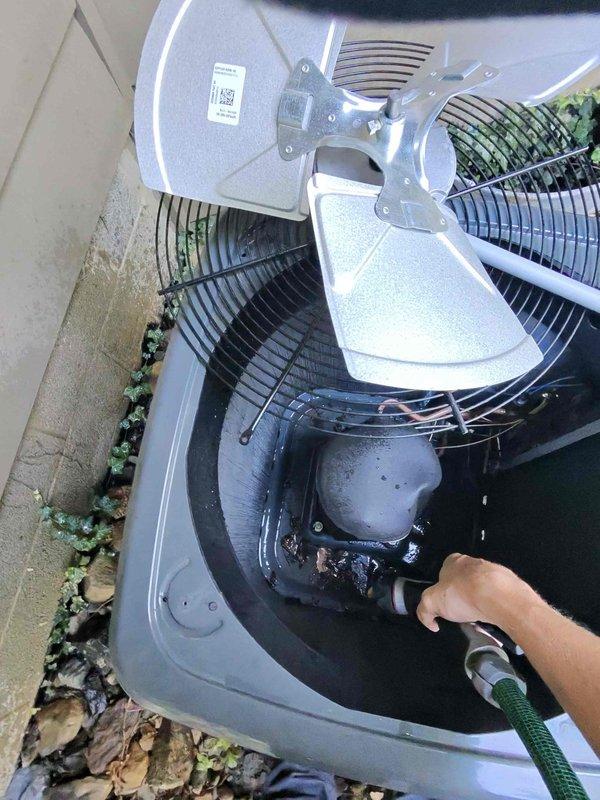 Completed scheduled preventative maintenance on residential cooling system. Performed exterior condenser unit cleaning, removing accumulated dirt, debris, and grime from compressor components and coil surfaces using water spray method. Inspected internal air handler components, verified proper electrical connections and control module operation, and confirmed all system wiring and components are functioning within normal parameters.