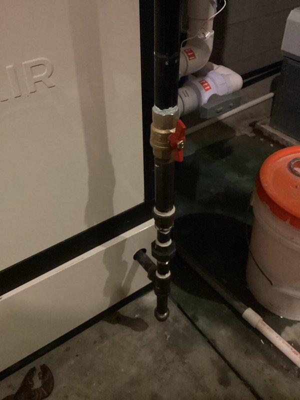 Replaced gas shut-off valve with new brass ball valve assembly on black iron gas supply line. Installation included proper threading, sealing, and testing of all connections to ensure leak-free operation and code compliance.