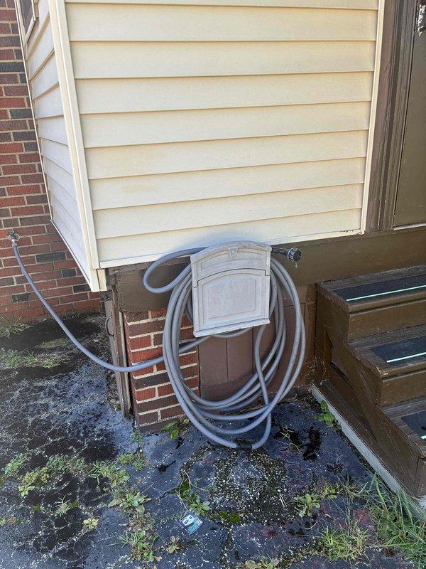 Completed scheduled preventative cooling maintenance on residential air conditioning system. Performed comprehensive inspection of outdoor condenser unit, including examination of heat exchanger coils, fan operation, and electrical connections. Unit found to be operating within normal parameters with adequate airflow through louvered fins and proper fan blade rotation. Noted minor vegetation growth around unit base on gravel pad; recommended maintaining clearance for optimal performance.