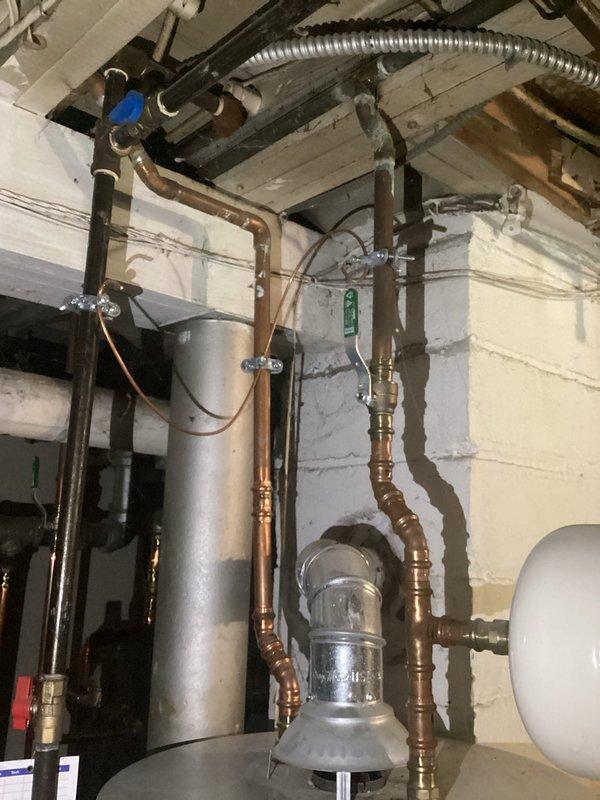 Conducted on-site assessment for emergency backup generator installation in residential property. Evaluated existing electrical infrastructure in basement utility area, documenting current mechanical and plumbing systems to determine optimal generator placement and electrical integration points. Photographed existing conditions including exposed ceiling joists, copper piping network, HVAC components, and available wall space for transfer switch and generator connection equipment. Assessed structural considerations and clearance requirements for code-compliant installation. Identified suitable location for exterior generator pad placement and evaluated conduit routing path from proposed generator location through basement utility area to main electrical panel. Documented existing electrical service capacity and panel configuration to determine compatibility with automatic transfer switch installation. Noted basement access points and workspace availability for installation crew. Prepare