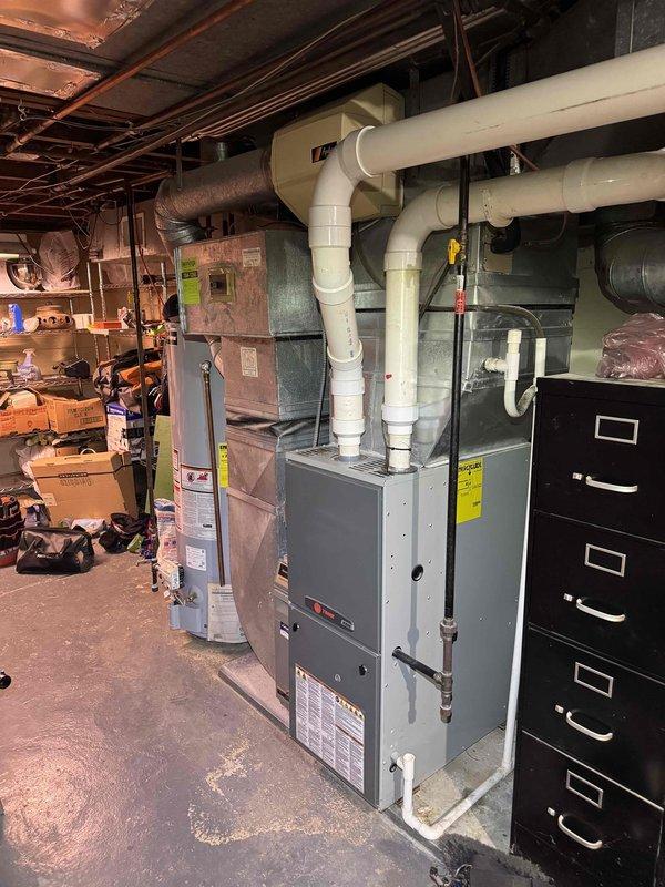 Completed scheduled preventative maintenance on residential cooling system as part of ongoing service plan. Performed comprehensive inspection of both indoor furnace units and outdoor condensing unit, including electrical testing of control circuits and verification of proper voltage readings at terminal connections. All equipment operating within normal parameters with no issues identified.