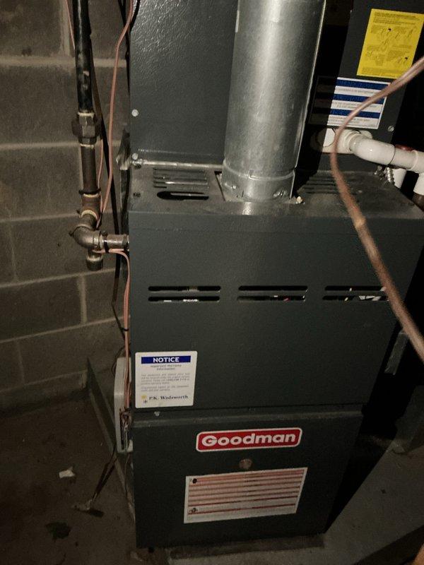 Completed scheduled preventive maintenance on residential split-system air conditioning unit as part of ongoing recurring service plan. Performed comprehensive inspection of outdoor Goodman condenser unit and indoor furnace/air handler system, verifying proper operation of all cooling components, checking refrigerant levels, inspecting electrical connections, and ensuring optimal system performance for continued reliable operation throughout the cooling season.