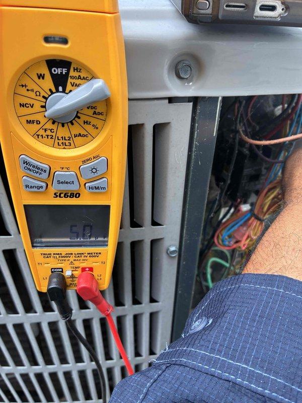 Performed scheduled cooling system maintenance on outdoor condensing unit. Conducted electrical diagnostics using digital multimeter to verify proper voltage and amperage readings across system components. Tested capacitor values and verified compressor operation within manufacturer specifications. All electrical connections were inspected and found secure with no signs of overheating or corrosion. Unit operating normally with proper readings recorded for future reference.