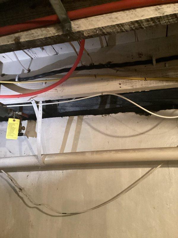 Conducted on-site assessment for new Generac generator installation. Evaluated existing electrical service entrance, utility meter location, and available space for generator placement adjacent to building exterior. Documented current gas meter configuration and underground utility routing to determine optimal generator positioning and required transfer switch installation. Photographed existing infrastructure including basement utility runs to assess electrical panel accessibility and plan for automatic transfer switch wiring. Provided comprehensive quote for complete generator system installation including all necessary electrical connections and permits.
