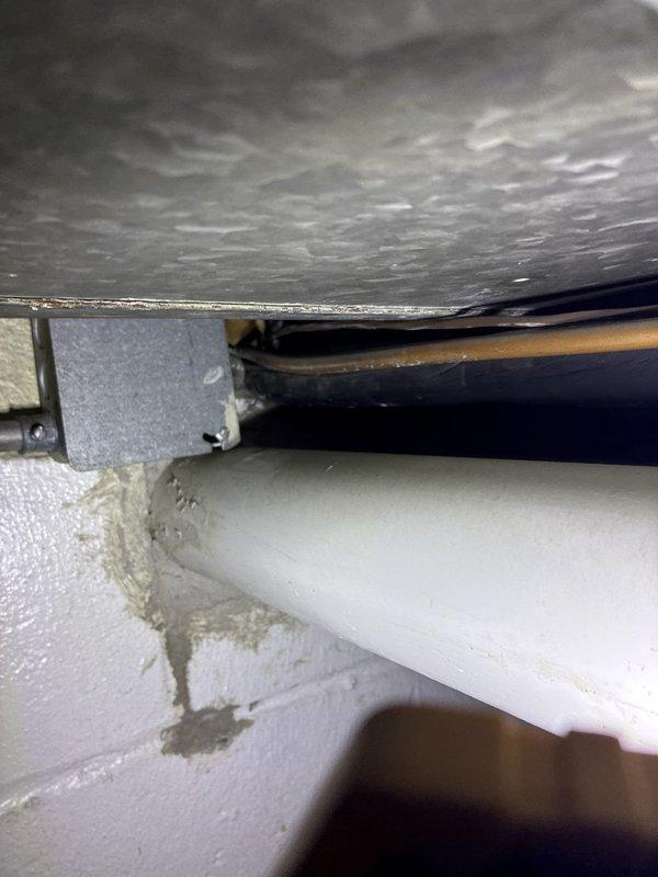 Conducted on-site consultation for furnace replacement options. Evaluated existing HVAC system including indoor furnace installation in attic space and outdoor condensing unit positioned on concrete pad against exterior brick wall. Documented current equipment configuration and discussed available replacement solutions with homeowner to address heating system needs.