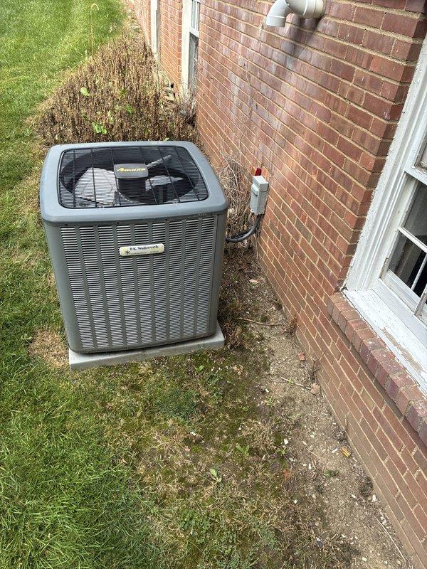 Conducted on-site consultation for furnace replacement options. Evaluated existing HVAC system including indoor furnace installation in attic space and outdoor condensing unit positioned on concrete pad against exterior brick wall. Documented current equipment configuration and discussed available replacement solutions with homeowner to address heating system needs.