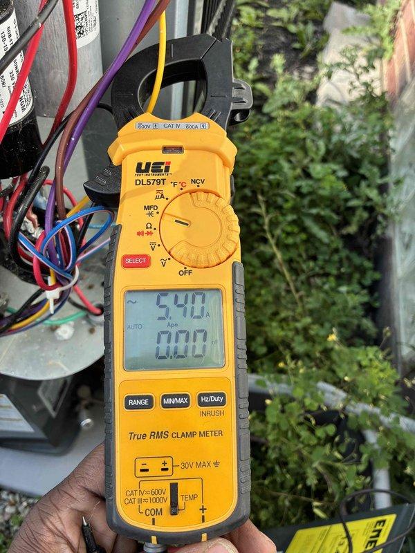 Completed first-year cooling maintenance on HVAC system. Performed comprehensive electrical diagnostics using clamp meter, measuring amperage draw on both indoor and outdoor units to verify proper motor and compressor operation. All electrical components tested within normal operating parameters, with readings confirming system efficiency and proper performance.