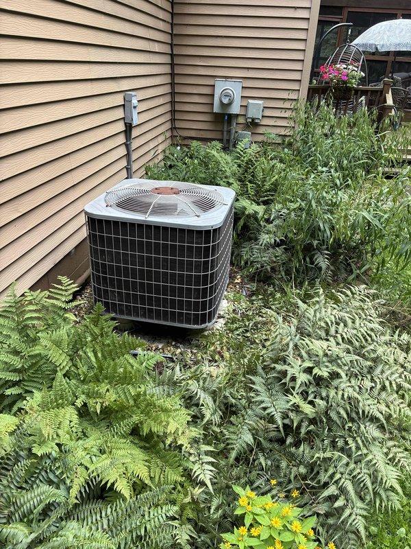 Responded to no cooling complaint where compressor motor was reportedly locking up. Upon inspection, found failed dual-run capacitor with visible deterioration and corrosion on terminals. Replaced defective capacitor, tested system operation, and verified compressor motor running properly with normal amp draw and cooling restored.