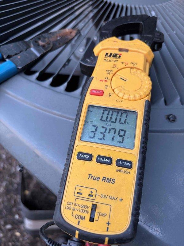 Performed comprehensive cooling system maintenance on a 9-year-old air conditioning unit. Conducted electrical diagnostics using digital clamp meter to verify proper amperage draw and system performance. Inspected condenser unit components, cleaned coils, and confirmed operational efficiency of outdoor unit and fan assembly.