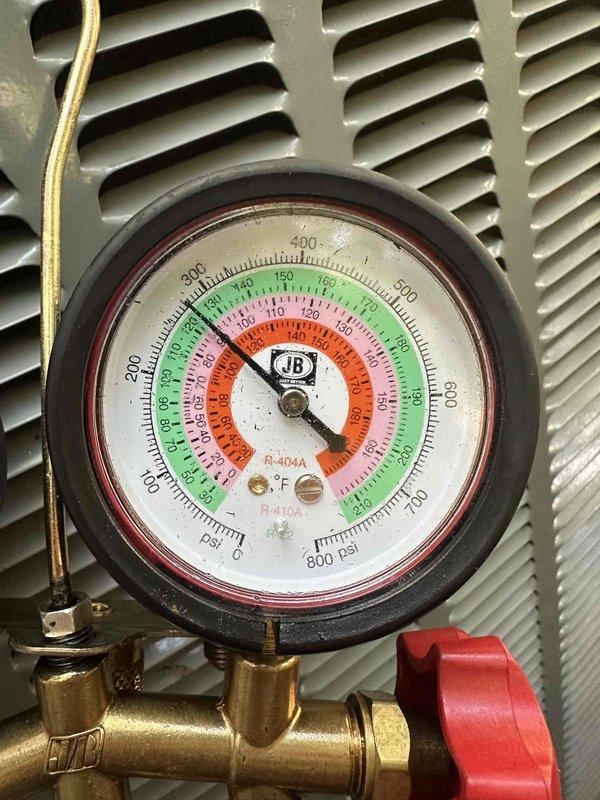 # HVAC Cooling Maintenance Summary

Completed scheduled preventive maintenance on residential air conditioning system. Performed comprehensive system inspection including refrigerant pressure verification using manifold gauges on R-410A system, with readings within manufacturer specifications across all pressure zones. Inspected and evaluated blower wheel assembly, confirming proper blade condition and cleanliness for optimal airflow. All components operating normally with no deficiencies noted. System left in proper working condition.