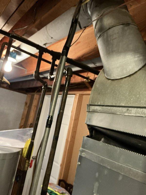 Conducted comprehensive site assessment for residential backup generator installation. Evaluated existing electrical infrastructure in basement utility area, documenting current service panel location, available conduit pathways, and clearance requirements for generator transfer switch installation. Inspected exterior AC condenser placement and surrounding area to determine optimal generator positioning, considering utility access, fuel line routing, and code-compliant clearances from building structures and HVAC equipment. Photographed existing mechanical systems, ductwork configurations, and landscape features to facilitate accurate material estimation and installation planning. Assessed electrical load requirements and prepared detailed scope of work for whole-house generator system with automatic transfer switch.