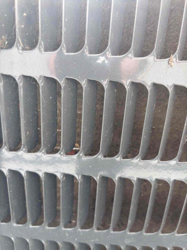 # HVAC Cooling Maintenance Summary

Completed routine preventative maintenance service on residential cooling system under recurring maintenance agreement. Performed comprehensive inspection of evaporator coil, revealing moderate accumulation of dust, debris, and particulate matter on fin surfaces and between fin spacing. Documented current condition of heat exchanger components through photographic evidence, noting presence of condensation and moisture on coil surfaces consistent with normal system operation. All observations recorded for maintenance history and future service reference.

# Detailed Work Performed

Conducted thorough visual inspection of indoor evaporator coil assembly, examining fin condition, spacing integrity, and overall component cleanliness. Assessed accumulation levels of dust and debris on coil fins, noting brownish-gray buildup concentrated primarily between fin rows and on horizontal surfaces. Verified structural integrity of aluminum fin assembly and metal 