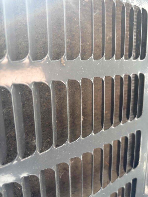 # HVAC Cooling Maintenance Summary

Completed routine preventative maintenance service on residential cooling system under recurring maintenance agreement. Performed comprehensive inspection of evaporator coil, revealing moderate accumulation of dust, debris, and particulate matter on fin surfaces and between fin spacing. Documented current condition of heat exchanger components through photographic evidence, noting presence of condensation and moisture on coil surfaces consistent with normal system operation. All observations recorded for maintenance history and future service reference.

# Detailed Work Performed

Conducted thorough visual inspection of indoor evaporator coil assembly, examining fin condition, spacing integrity, and overall component cleanliness. Assessed accumulation levels of dust and debris on coil fins, noting brownish-gray buildup concentrated primarily between fin rows and on horizontal surfaces. Verified structural integrity of aluminum fin assembly and metal 