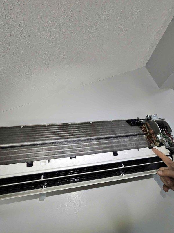 Performed maintenance cleaning on three wall-mounted mini split indoor air handler units. Accessed evaporator coils by removing front cover panels, cleaned aluminum cooling fins and internal components to restore proper airflow and system efficiency.