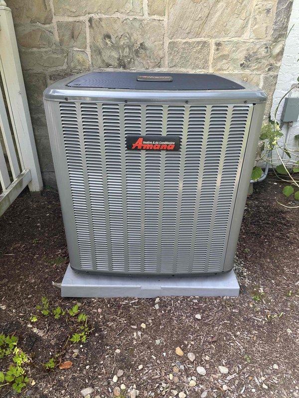 # HVAC Cooling Maintenance Summary

Completed comprehensive cooling system maintenance on residential split-system air conditioning unit. Performed routine inspection and servicing of Amana outdoor condenser unit and Goodman indoor furnace/air handler located in basement mechanical room. System operational and ready for continued cooling season use.

# Detailed Service Description

Performed scheduled preventative maintenance on residential cooling system consisting of outdoor Amana condenser unit and indoor Goodman air handler with integrated furnace.

**Outdoor Condenser Unit Service:**
Inspected Amana condenser unit positioned on concrete pad at exterior wall. Verified unit mounting stability and proper clearances for adequate airflow. Examined cabinet condition, noting intact louvered panels and protective top cover. Checked electrical disconnect box and conduit connections for secure mounting and proper operation. Assessed surrounding area, confirming adequate drainage and minimal