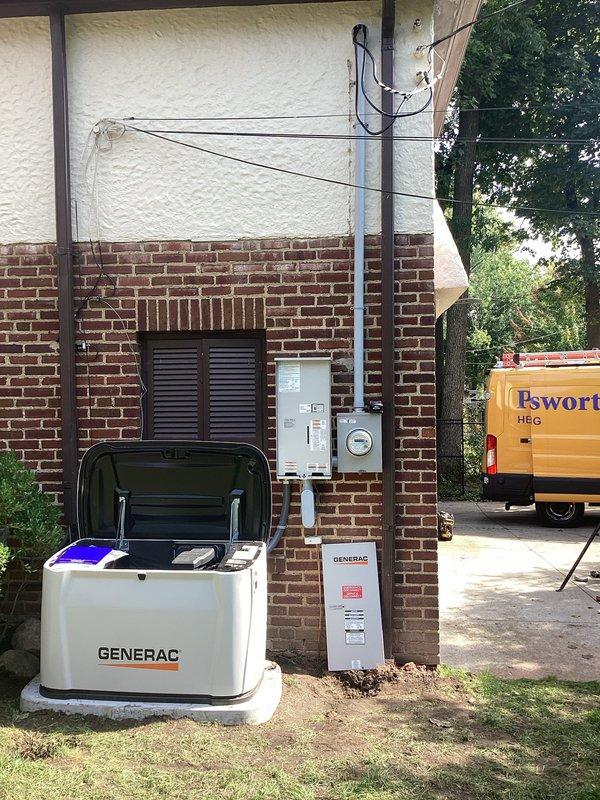 Completed full residential backup power system installation including Generac whole-home generator mounted on concrete pad, 200-amp electrical service upgrade with new meter socket and panel, and whole-home surge protection device. Installation required coordination between electrical and plumbing trades, with new exterior conduit runs along brick exterior, proper generator transfer switch integration, and HVAC condensate drainage system accommodation to ensure all systems function safely together.