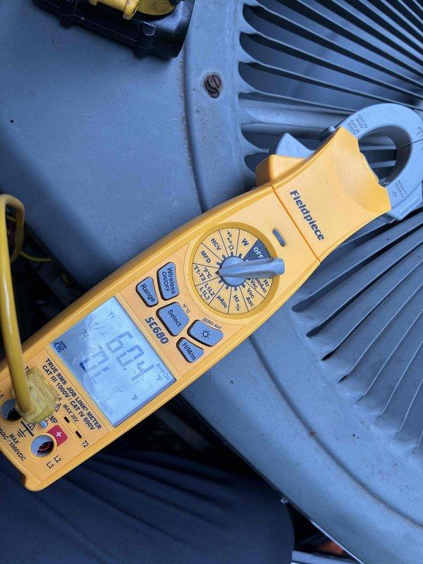 Completed scheduled preventive maintenance on residential cooling system. Performed comprehensive system diagnostics using Fieldpiece SC680 and SC660 meters to verify electrical performance and measure operating amperage, which registered at 126.6 amps. Inspected condenser unit components including refrigerant lines, heat exchanger fins, and electrical connections. All measurements fell within manufacturer specifications, and system demonstrated proper operational parameters throughout testing sequence.