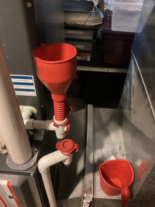 Completed scheduled preventive maintenance on residential cooling system under recurring service plan. Inspected and verified proper operation of compressor capacitor, electrical connections, and condensate drainage system including funnel assembly and PVC drain lines. All components found in good working condition with no deficiencies noted.