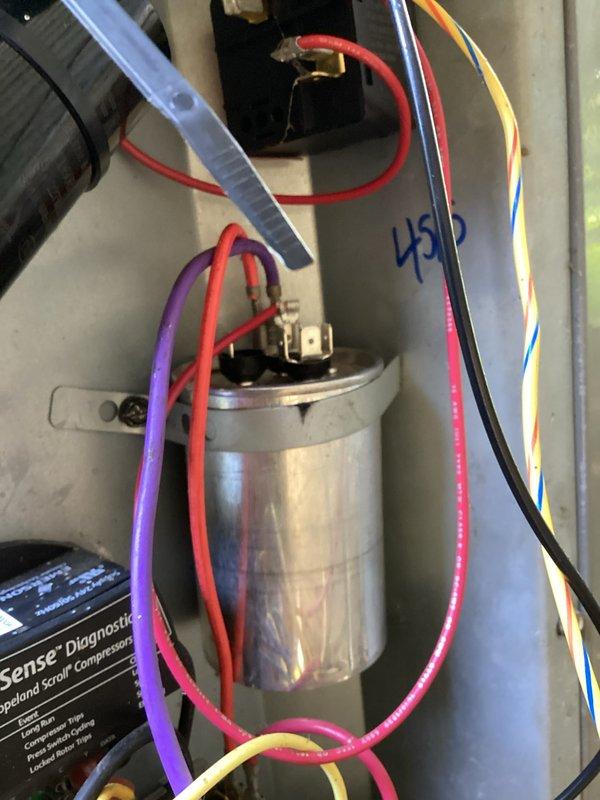 Completed scheduled preventive maintenance on residential cooling system under recurring service plan. Inspected and verified proper operation of compressor capacitor, electrical connections, and condensate drainage system including funnel assembly and PVC drain lines. All components found in good working condition with no deficiencies noted.