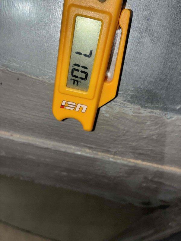 Responded to cooling complaint with thermostat set at 72°F but space temperature reading 76°F. Performed system diagnostics and temperature measurements at multiple points including supply air reading 52.5°F and return air reading 75°F. Based on previous service history indicating potential refrigerant loss and current temperature differential analysis, system performance suggests possible refrigerant leak requiring further leak search procedure to identify and resolve underlying issue.