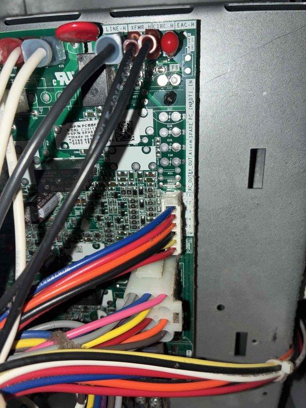 Performed scheduled preventive maintenance on HVAC cooling system control board and electrical components. Inspected printed circuit board assembly, verifying proper operation of integrated circuits, capacitors, resistors, and all surface-mounted components. Examined all wire connections including line voltage, transformer, and thermostat terminals to ensure secure attachment and proper routing. Confirmed emergency stop switch functionality and verified all terminal connections were tight and free of corrosion.