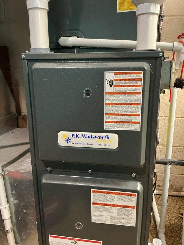 Responded to customer complaint of odor in home when air conditioning system operates. Performed thorough inspection of HVAC system including furnace unit and associated components. Examined air handler, ductwork connections, and PVC condensate drain lines with shutoff valves for potential sources of odor. Documented existing system configuration and condition with photographs for service records.