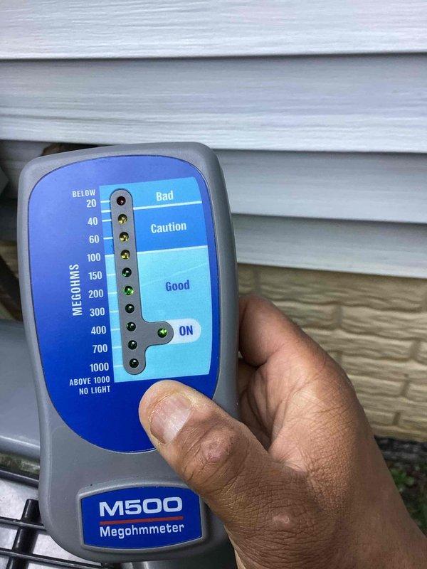 # HVAC Cooling Maintenance Summary

Completed scheduled preventive maintenance service on residential cooling system. Performed comprehensive electrical diagnostics including insulation resistance testing using megohmmeter, which indicated readings within acceptable parameters in the "Good" zone. Conducted voltage and amperage measurements with digital multimeter to verify proper electrical performance of system components. All electrical connections and components tested satisfactory with no deficiencies noted.

# Detailed Service Report

Performed routine preventive maintenance inspection on residential air conditioning system as part of ongoing service agreement. Conducted thorough electrical system diagnostics to assess overall equipment health and performance.

Utilized megohmmeter (M500) to test insulation resistance of electrical components and motor windings. Testing revealed measurements registering in the acceptable "Good" range on the device scale, indicating proper insulati