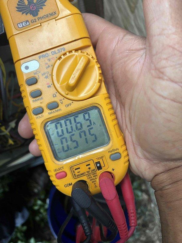 # HVAC Cooling Maintenance Summary

Completed scheduled preventive maintenance service on residential cooling system. Performed comprehensive electrical diagnostics including insulation resistance testing using megohmmeter, which indicated readings within acceptable parameters in the "Good" zone. Conducted voltage and amperage measurements with digital multimeter to verify proper electrical performance of system components. All electrical connections and components tested satisfactory with no deficiencies noted.

# Detailed Service Report

Performed routine preventive maintenance inspection on residential air conditioning system as part of ongoing service agreement. Conducted thorough electrical system diagnostics to assess overall equipment health and performance.

Utilized megohmmeter (M500) to test insulation resistance of electrical components and motor windings. Testing revealed measurements registering in the acceptable "Good" range on the device scale, indicating proper insulati