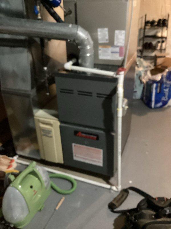 Completed preventive maintenance on 6-year-old Carrier cooling system. Inspected indoor Amana furnace unit and outdoor condenser, checked refrigerant levels, cleaned condenser coils, tested electrical connections, verified proper airflow and system operation. All components functioning within manufacturer specifications; system ready for cooling season.
