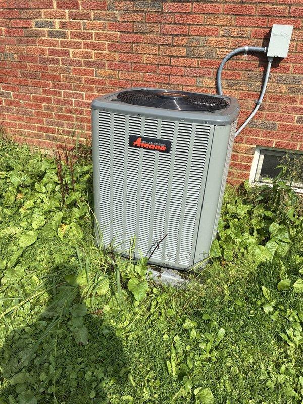 Completed routine cooling maintenance on residential Amana air conditioning system. Performed comprehensive inspection of outdoor condenser unit, including cleaning of coils, verification of refrigerant levels, and assessment of electrical connections. Inspected ventilation components and documented system condition with photographic records to ensure proper operation heading into the cooling season.