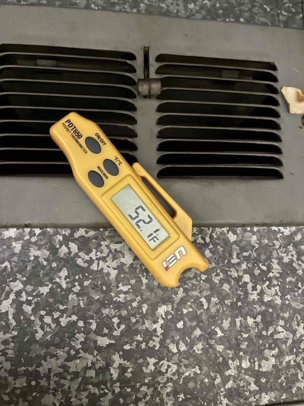 Completed HVAC cooling tune-up including system performance verification and temperature diagnostics. Supply air temperature measured at 52°F at register, confirming proper cooling operation. Inspected accessible ductwork and system components in attic space with all equipment functioning within normal parameters.