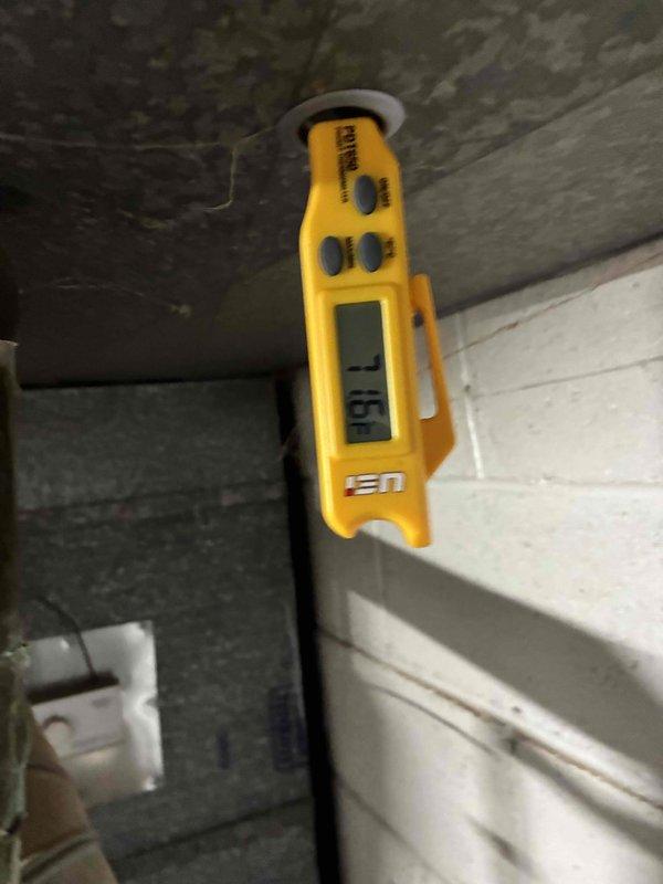 Completed HVAC cooling tune-up including system performance verification and temperature diagnostics. Supply air temperature measured at 52°F at register, confirming proper cooling operation. Inspected accessible ductwork and system components in attic space with all equipment functioning within normal parameters.