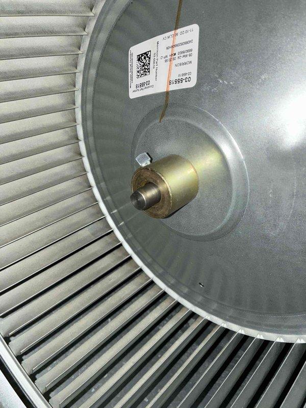 Responded to service call for loud buzzing noise on recently installed Goodman air conditioning system. Upon arrival, performed diagnostic inspection of indoor furnace unit and blower motor assembly. Identified issue with blower motor experiencing mechanical noise during startup cycles. Inspected motor mounting, bearings, and fan wheel assembly for loose components or obstructions. Verified proper electrical connections and capacitor function. Documented equipment condition with photographs showing furnace installation and blower motor assembly details. Unit is under manufacturer warranty coverage. Provided customer with findings and recommended contacting warranty service for authorized motor replacement or repair to resolve buzzing noise issue.