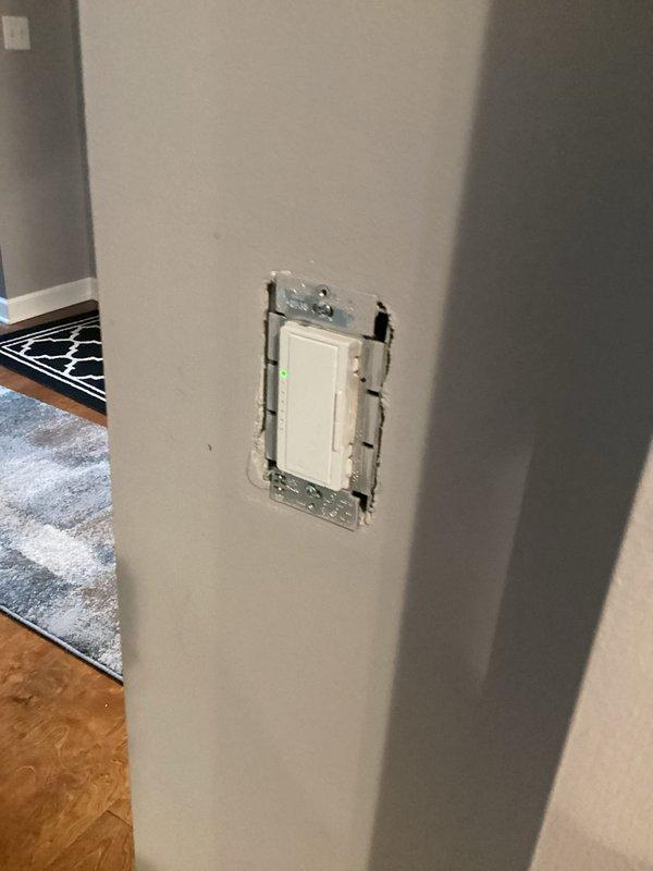 Responded to follow-up service call regarding kitchen lighting issues that developed after previous electrical work. Conducted thorough inspection of kitchen light switch and associated wiring to identify root cause of intermittent lighting problems. Examined switch installation, verified proper connections at terminals, tested for loose wiring or faulty switch mechanism, and ensured all connections were secure within the electrical box. Replaced kitchen light switch and confirmed proper operation of all kitchen lighting circuits upon completion.