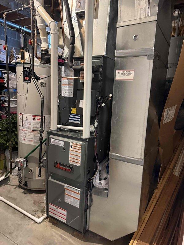 Completed full HVAC system installation including two S-Series units, two humidifiers, and two air scrubbers in residential basement mechanical room. All equipment properly mounted, connected with appropriate PVC condensate drainage, ductwork, electrical conduit, and gas lines per manufacturer specifications and local code requirements.