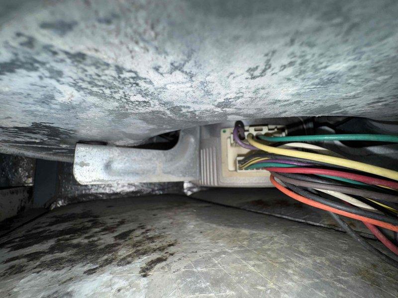 Responded to service call for system running continuously without responding to thermostat commands. Upon inspection, found extensive frost and ice buildup on evaporator coil in attic air handler unit. Diagnosed frozen coil condition causing system to run non-stop despite thermostat input. Identified restricted airflow and possible low refrigerant charge as contributing factors. Thawed evaporator coil, verified proper airflow through system, and checked refrigerant levels. System restored to normal operation with proper cycling control through thermostat.